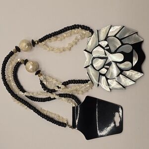 Lee Sands Mother of Pearl Lion Head Pendant Necklace